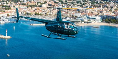 Green bees Helico flying over Cannes